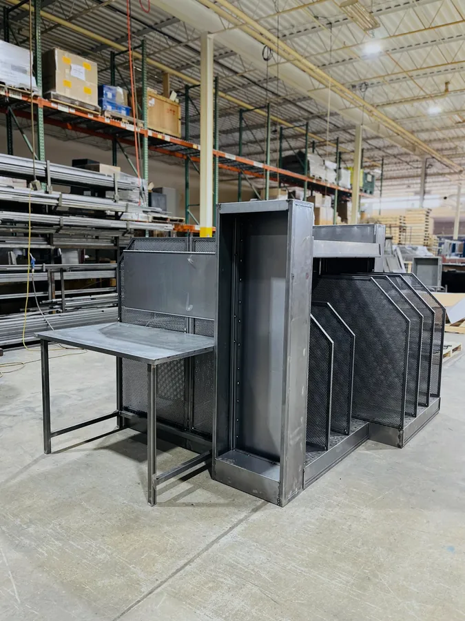 Perforated mesh display fixture with integrated table