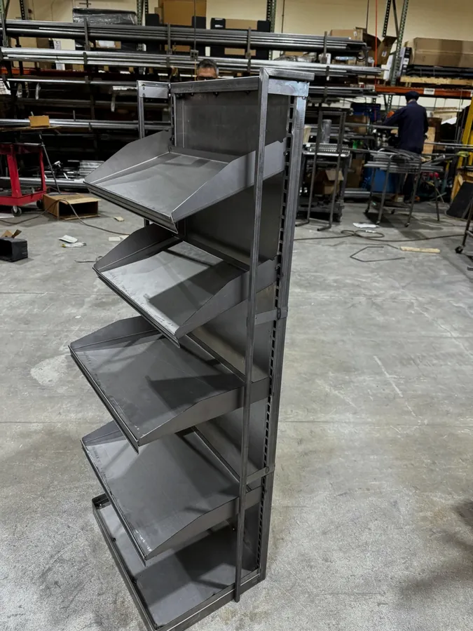 Angled shelf display rack